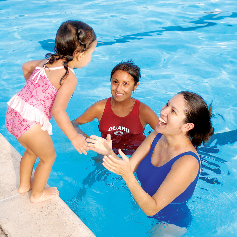 A youth enjoying her first swim lessons 