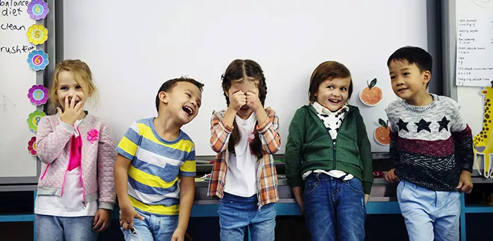 Group of young kids laughing