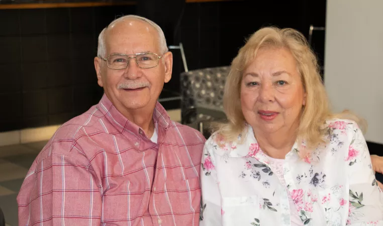 Man and woman smiling