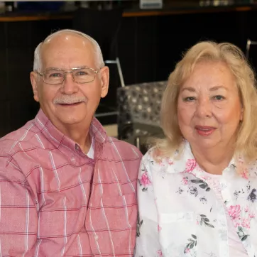 Man and woman smiling