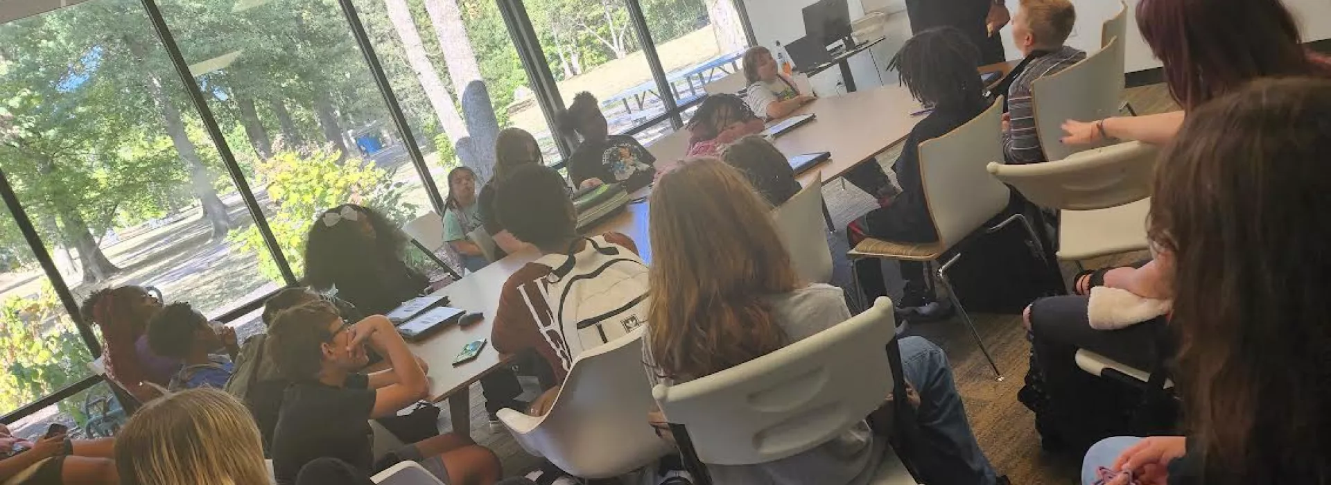 Kids and staff at tables