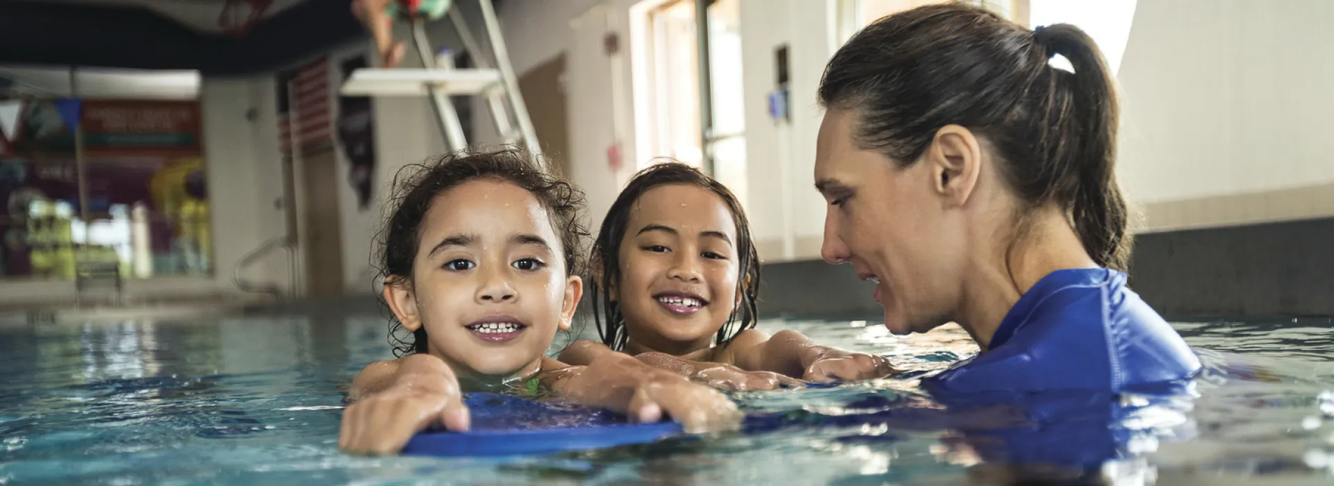 A YMCA member learning how to swim