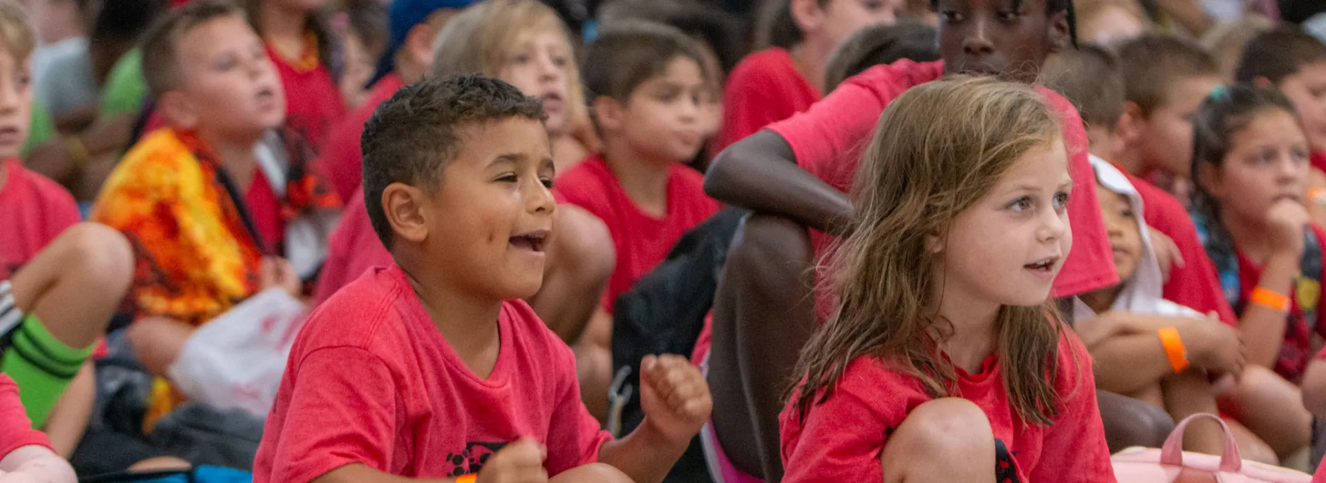 Two youth excited at Spirit day for the COSI event